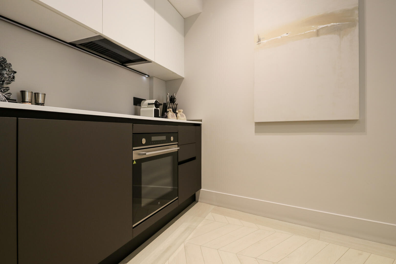 Fully equipped CREO-Kitchen complete with art to make it feel like a home