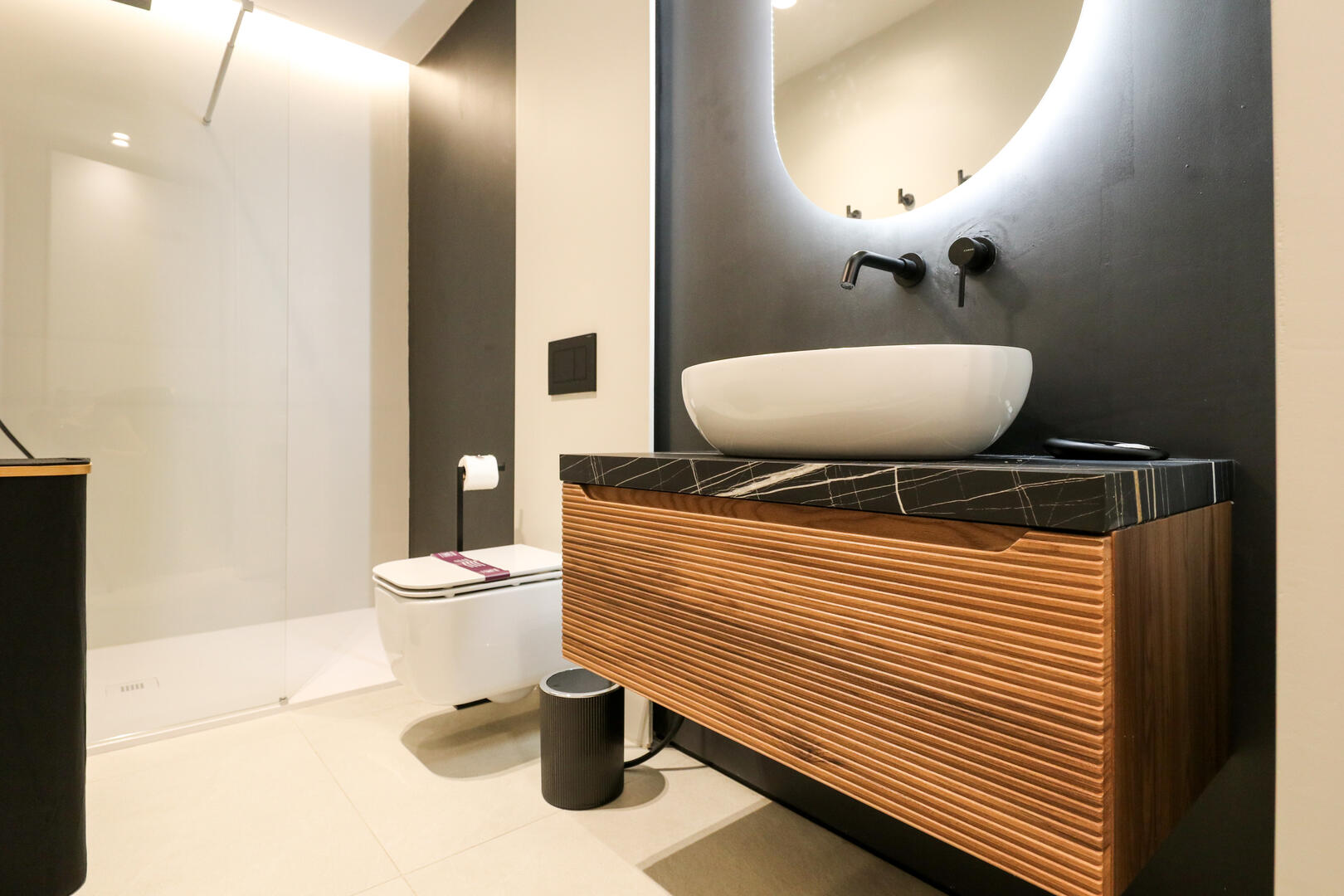 Loads of space and luxury fixtures in this designer bathroom